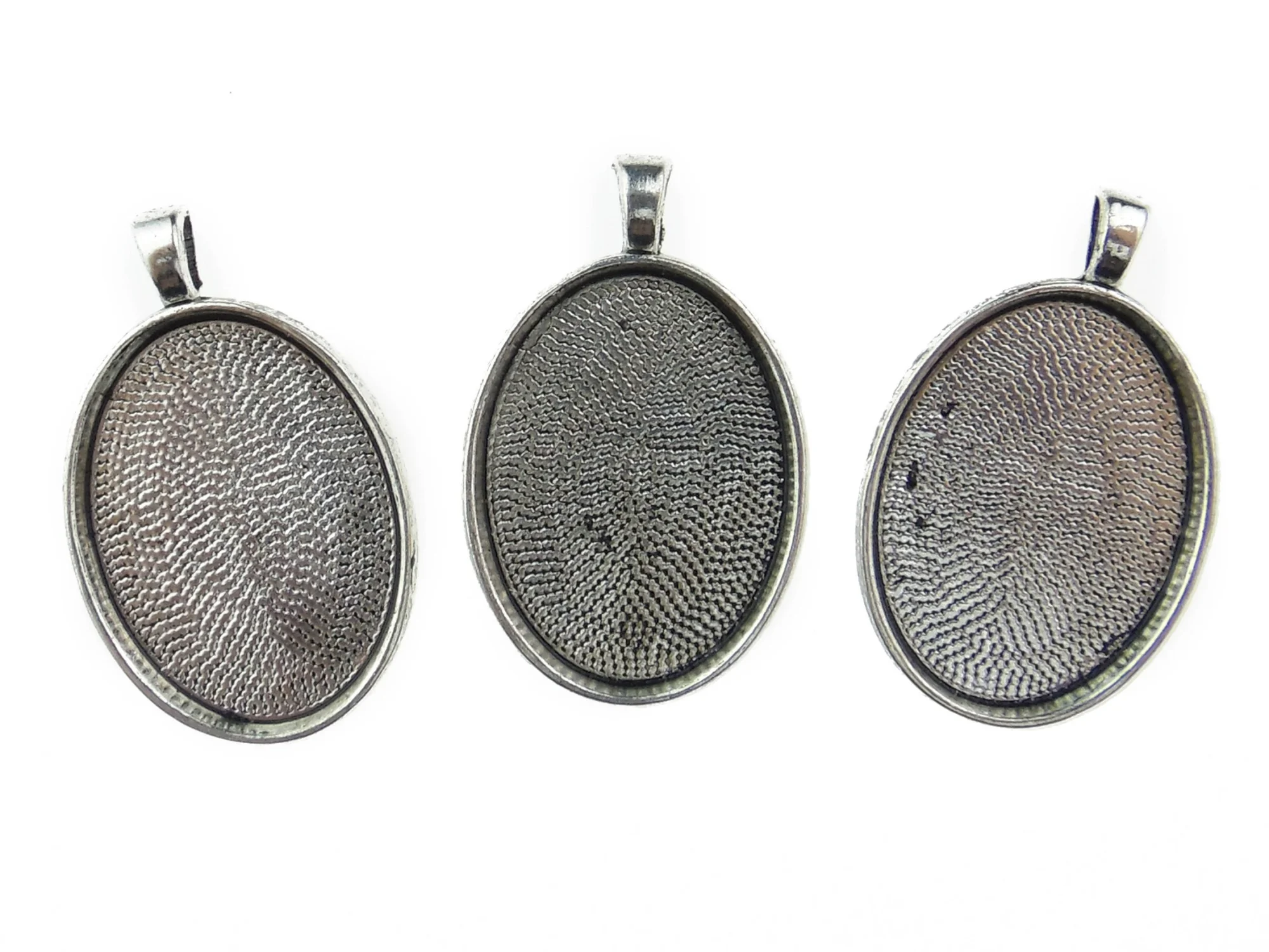 Baza cabochon. Interior platou: 30x22mm